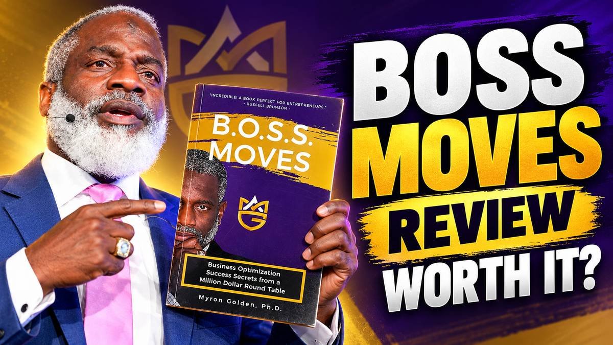 Myron Golden holding the Boss Moves book
